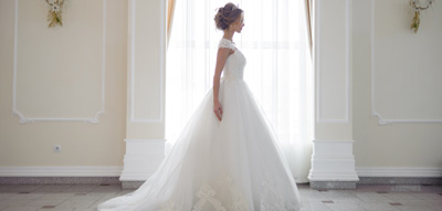 Woman standing in a wedding dress